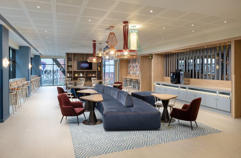 HbH_MANRD_Lobby_lounge 1 with logo