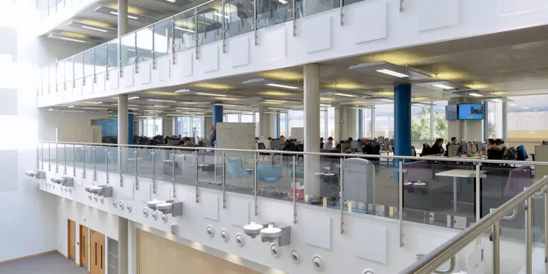 Open plan office with balcony overlooking lobby